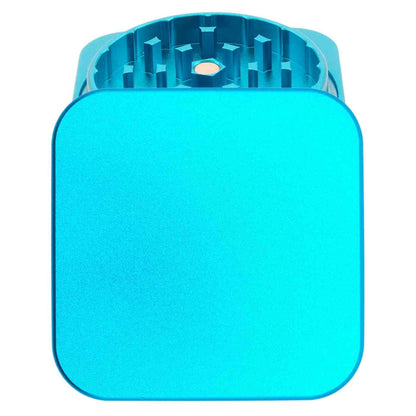 Quadratischer Grinder in Türkis – individuell gestalten und mit Gravur personalisieren.